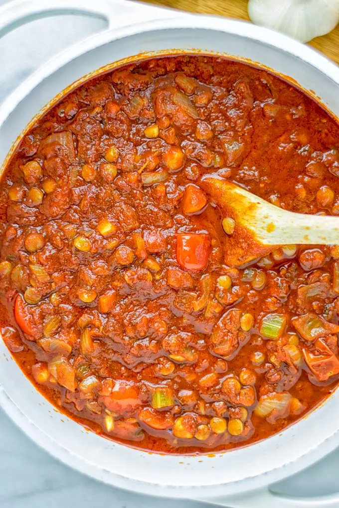 This Chickpea Lentil Bolognese is naturally vegan, gluten free and so super easy to make in one pot. It’s amazing over your favorite pasta for dinner, lunch, meal preparation or a great dairy free alternative for work lunch. #vegan #glutenfree #dairyfree #vegetarian #onepotmeals #dinner #lunch #mealprep #worklunchideas #chickpeas #lentils #chickpeabolognese #lentilbolognese #contentednesscooking