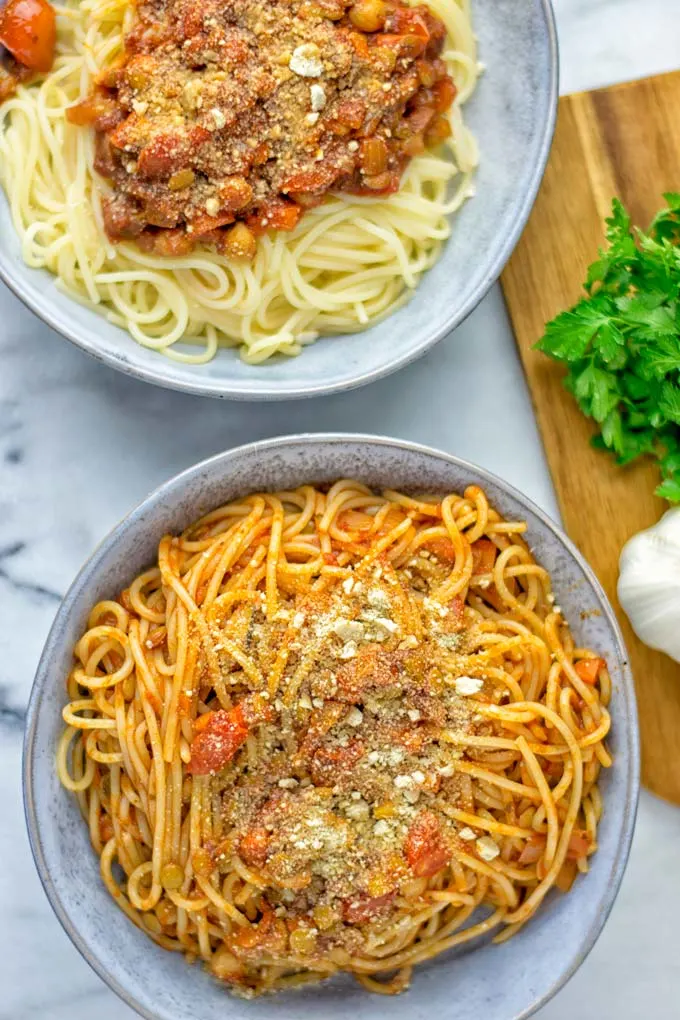 This Chickpea Lentil Bolognese is naturally vegan, gluten free and so super easy to make in one pot. It’s amazing over your favorite pasta for dinner, lunch, meal preparation or a great dairy free alternative for work lunch. #vegan #glutenfree #dairyfree #vegetarian #onepotmeals #dinner #lunch #mealprep #worklunchideas #chickpeas #lentils #chickpeabolognese #lentilbolognese #contentednesscooking