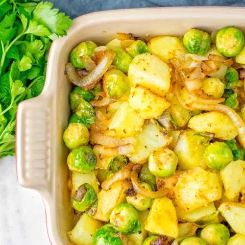 These Garlic Brussels Sprouts Potatoes are naturally vegan, gluten free and super easy to make. So delicious for the holidays, Christmas, as dinner, lunch, appetizer, side dish or meal preparation, and so much more. On its own or served with many other yummy things, enjoy. #vegan #glutenfree #dairyfree #vegetarian #contentednesscooking #brusselssprouts #potatoes #dinner #lunch #appetizer #sidedishes #christmas #holidays #thanksgiving #mealprep #worklunchideas