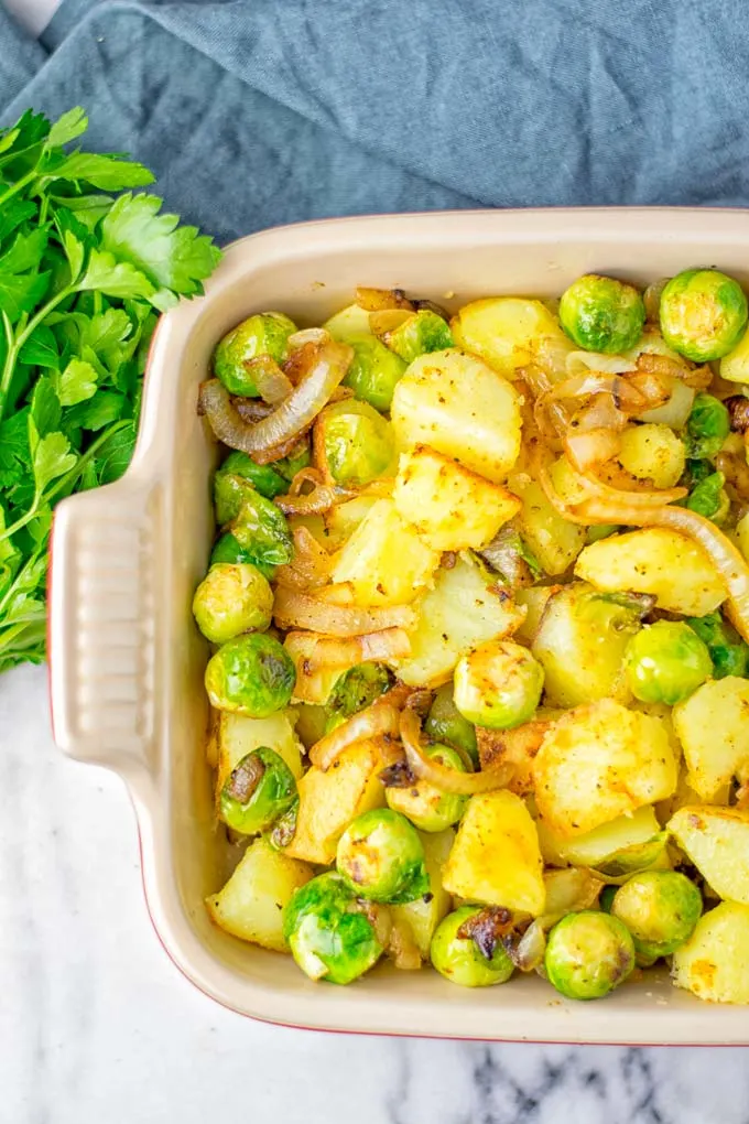 These Garlic Brussels Sprouts Potatoes are naturally vegan, gluten free and super easy to make. So delicious for the holidays, Christmas, as dinner, lunch, appetizer, side dish or meal preparation, and so much more. On its own or served with many other yummy things, enjoy. #vegan #glutenfree #dairyfree #vegetarian #contentednesscooking #brusselssprouts #potatoes #dinner #lunch #appetizer #sidedishes #christmas #holidays #thanksgiving #mealprep #worklunchideas