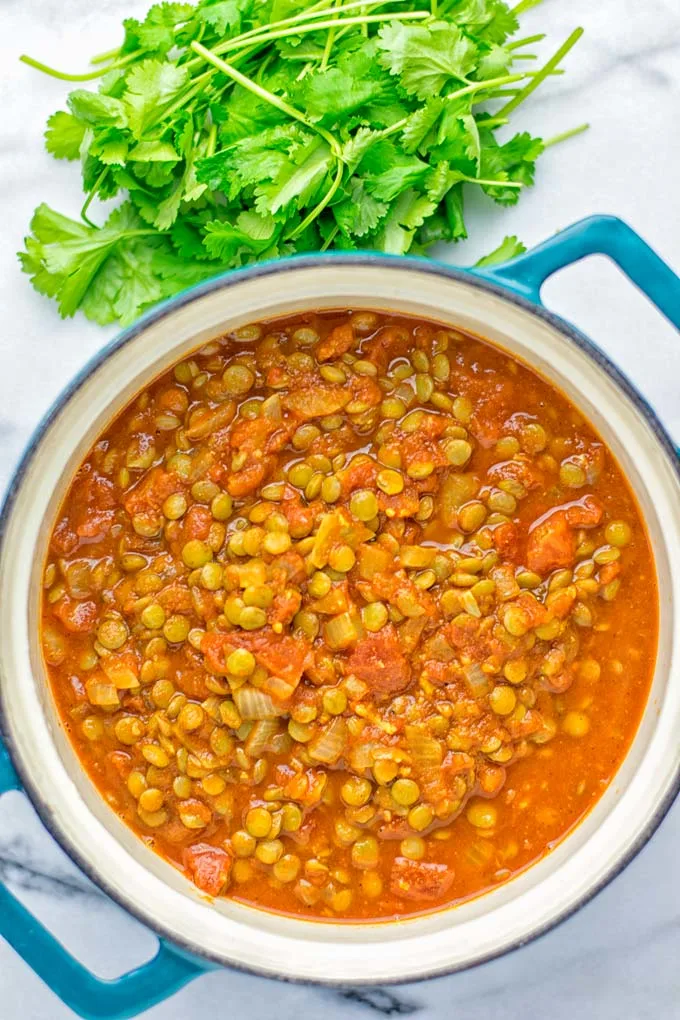 Amazingly tasty Moroccan Spiced Lentils super easy to make in one pot and packed with fantastic flavors. A super easy idea for lunch, dinner, meal prep and work lunch. Enjoy them plain, or over rice, so yummy! Try it now and you know what I’m taking about! #vegan #glutenfree #dairyfree #vegetarian #onepotmeals #lentils #moroccan #lunch #dinner #mealprep #worklunchideas #contentednesscooking #easyfood