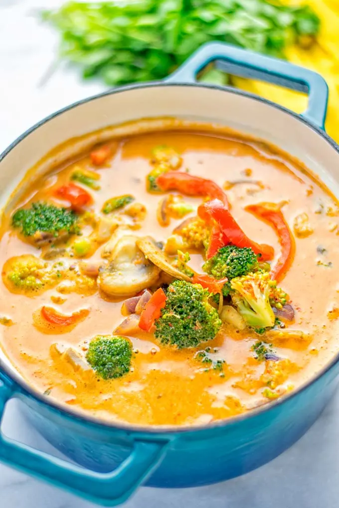 This Red Curry Coconut Soup is a super easy one pot meal and packed with such amazing flavors. It’s creamy and naturally vegan, gluten free. It’s an amazing dairy free alternative for lunch, dinner, meal preparation, that the whole family will love, or work lunches. Try it now and know how ridiculously easy delicious food can be. #vegan #glutenfree #dairyfree #contentednesscooking #dinner #lunch #onepotmeals #dairyfree #worklunchideas #curry #easyfood #vegetarian #soup #mealprep
