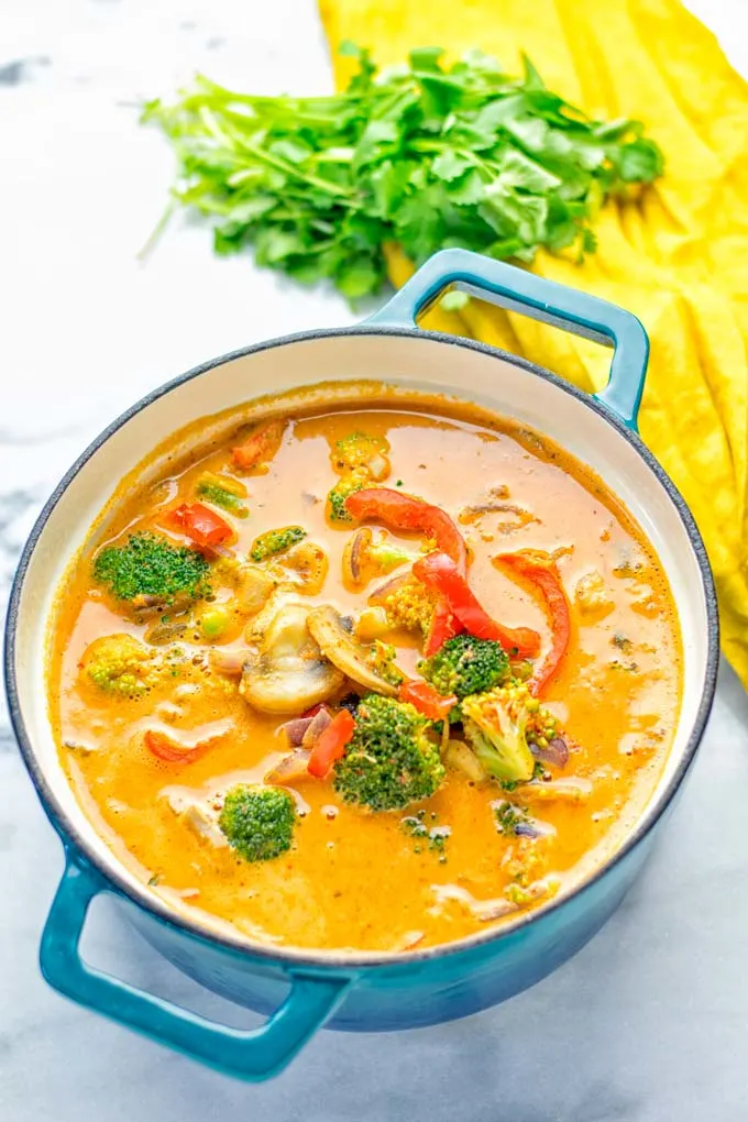 This Red Curry Coconut Soup is a super easy one pot meal and packed with such amazing flavors. It’s creamy and naturally vegan, gluten free. It’s an amazing dairy free alternative for lunch, dinner, meal preparation, that the whole family will love, or work lunches. Try it now and know how ridiculously easy delicious food can be. #vegan #glutenfree #dairyfree #contentednesscooking #dinner #lunch #onepotmeals #dairyfree #worklunchideas #curry #easyfood #vegetarian #soup #mealprep