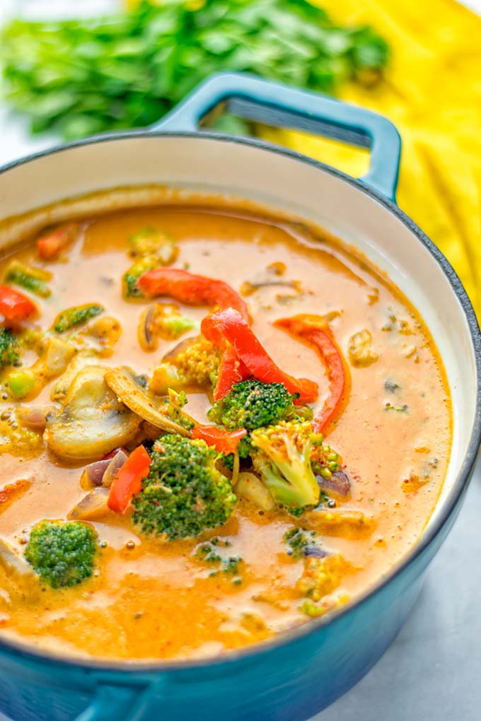 This Red Curry Coconut Soup is a super easy one pot meal and packed with such amazing flavors. It’s creamy and naturally vegan, gluten free. It’s an amazing dairy free alternative for lunch, dinner, meal preparation, that the whole family will love, or work lunches. Try it now and know how ridiculously easy delicious food can be. #vegan #glutenfree #dairyfree #contentednesscooking #dinner #lunch #onepotmeals #dairyfree #worklunchideas #curry #easyfood #vegetarian #soup #mealprep