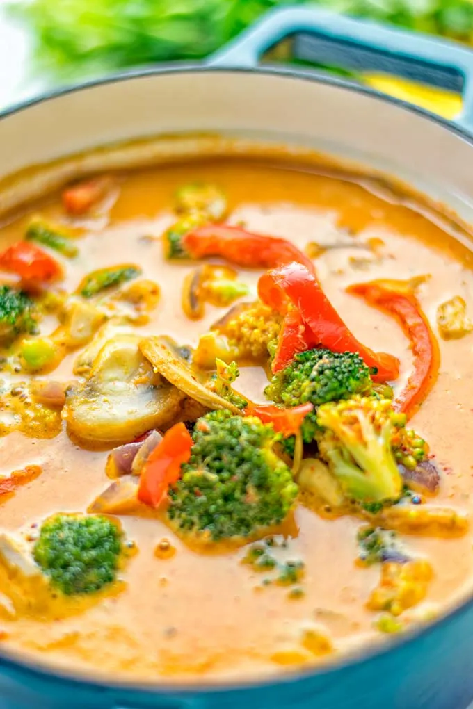 This Red Curry Coconut Soup is a super easy one pot meal and packed with such amazing flavors. It’s creamy and naturally vegan, gluten free. It’s an amazing dairy free alternative for lunch, dinner, meal preparation, that the whole family will love, or work lunches. Try it now and know how ridiculously easy delicious food can be. #vegan #glutenfree #dairyfree #contentednesscooking #dinner #lunch #onepotmeals #dairyfree #worklunchideas #curry #easyfood #vegetarian #soup #mealprep