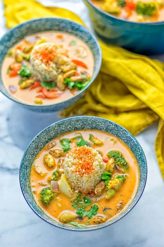 This Red Curry Coconut Soup is a super easy one pot meal and packed with such amazing flavors. It’s creamy and naturally vegan, gluten free. It’s an amazing dairy free alternative for lunch, dinner, meal preparation, that the whole family will love, or work lunches. Try it now and know how ridiculously easy delicious food can be. #vegan #glutenfree #dairyfree #contentednesscooking #dinner #lunch #onepotmeals #dairyfree #worklunchideas #curry #easyfood #vegetarian #soup #mealprep