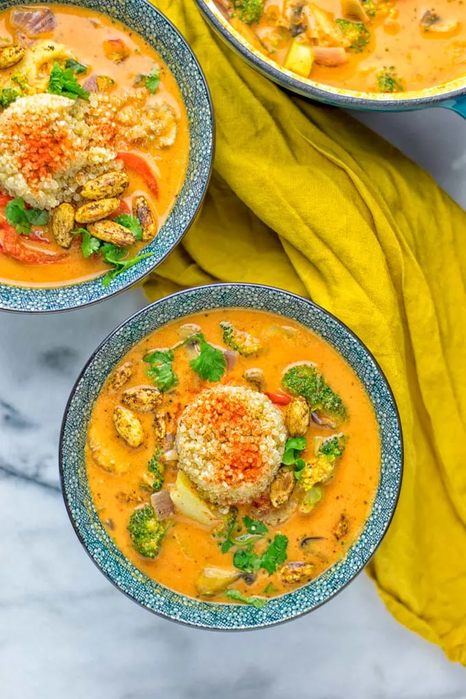 This Red Curry Coconut Soup is a super easy one pot meal and packed with such amazing flavors. It’s creamy and naturally vegan, gluten free. It’s an amazing dairy free alternative for lunch, dinner, meal preparation, that the whole family will love, or work lunches. Try it now and know how ridiculously easy delicious food can be. #vegan #glutenfree #dairyfree #contentednesscooking #dinner #lunch #onepotmeals #dairyfree #worklunchideas #curry #easyfood #vegetarian #soup #mealprep