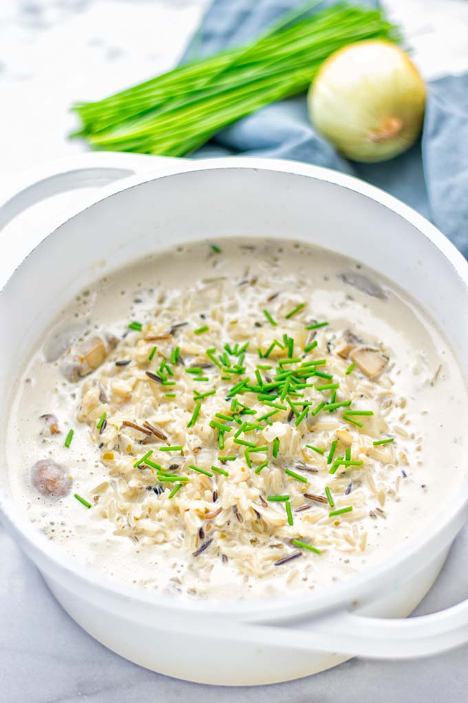 This Wild Rice and Mushroom Soup is entirely vegan, gluten free, and super easy to make in one pot. So amazing for the holidays, Christmas, dinner, lunch, meal preparation and work lunches. If you’re looking for a super easy and delicious one pot meal, you will make this over and over again. #vegan #glutenfree #dairyfree #vegetarian #onepotmeals #holidays #christmas #contentednesscooking #mushrooms #soup #wildricesoup #mushroomsoup #dinner #lunch #mealprep #worklunchideas 