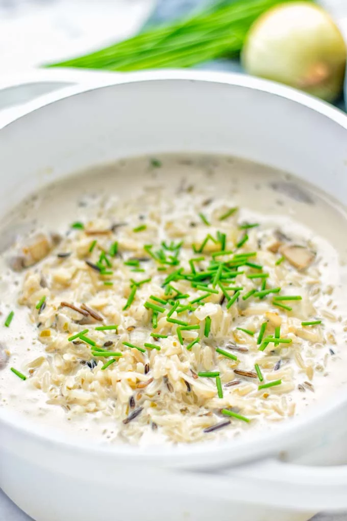 This Wild Rice and Mushroom Soup is entirely vegan, gluten free, and super easy to make in one pot. So amazing for the holidays, Christmas, dinner, lunch, meal preparation and work lunches. If you’re looking for a super easy and delicious one pot meal, you will make this over and over again. #vegan #glutenfree #dairyfree #vegetarian #onepotmeals #holidays #christmas #contentednesscooking #mushrooms #soup #wildricesoup #mushroomsoup #dinner #lunch #mealprep #worklunchideas 