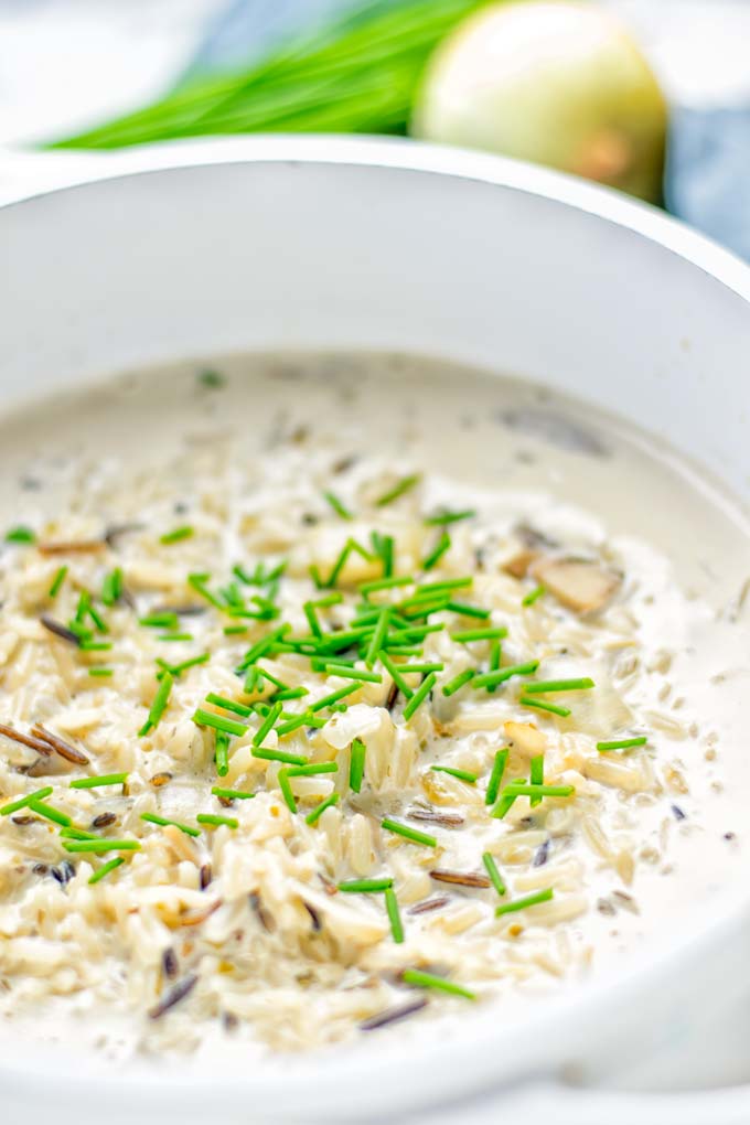 This Wild Rice and Mushroom Soup is entirely vegan, gluten free, and super easy to make in one pot. So amazing for the holidays, Christmas, dinner, lunch, meal preparation and work lunches. If you’re looking for a super easy and delicious one pot meal, you will make this over and over again. #vegan #glutenfree #dairyfree #vegetarian #onepotmeals #holidays #christmas #contentednesscooking #mushrooms #soup #wildricesoup #mushroomsoup #dinner #lunch #mealprep #worklunchideas 