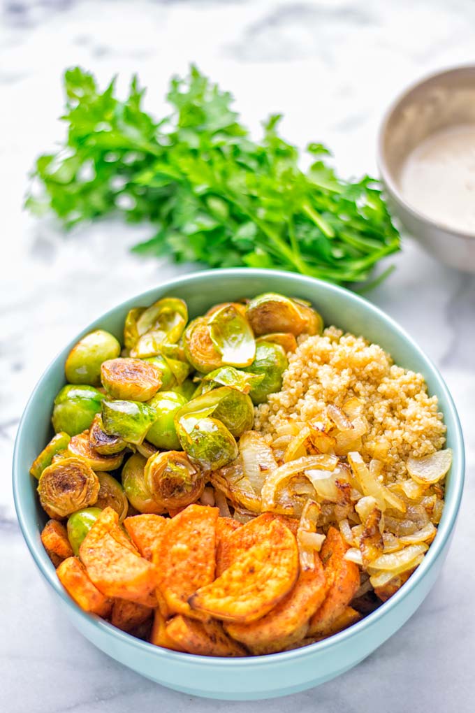 This Cajun Sweet Potato Brussels Sprout Salad is naturally vegan, gluten free and super easy to make. It’s so delicious for lunch, dinner, meal prep, work lunch, holidays and Christmas. Try it now, make this keeper again and again. #vegan #glutenfree #dairyfree #vegetarian #contentednesscooking #mealprep #worklunchideas #dinner #lunch #brusselsproutsalad #cajunsweetpotatoes #holidayfood #christmasrecipes #roastedbrusselssprouts #christmasfood #holidayrecipes 