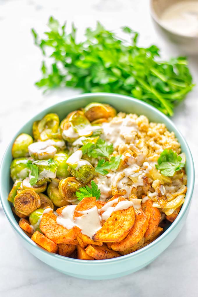 This Cajun Sweet Potato Brussels Sprout Salad is naturally vegan, gluten free and super easy to make. It’s so delicious for lunch, dinner, meal prep, work lunch, holidays and Christmas. Try it now, make this keeper again and again. #vegan #glutenfree #dairyfree #vegetarian #contentednesscooking #mealprep #worklunchideas #dinner #lunch #brusselsproutsalad #cajunsweetpotatoes #holidayfood #christmasrecipes #roastedbrusselssprouts #christmasfood #holidayrecipes 