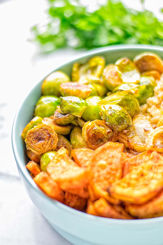 This Cajun Sweet Potato Brussels Sprout Salad is naturally vegan, gluten free and super easy to make. It’s so delicious for lunch, dinner, meal prep, work lunch, holidays and Christmas. Try it now, make this keeper again and again. #vegan #glutenfree #dairyfree #vegetarian #contentednesscooking #mealprep #worklunchideas #dinner #lunch #brusselsproutsalad #cajunsweetpotatoes #holidayfood #christmasrecipes #roastedbrusselssprouts #christmasfood #holidayrecipes 