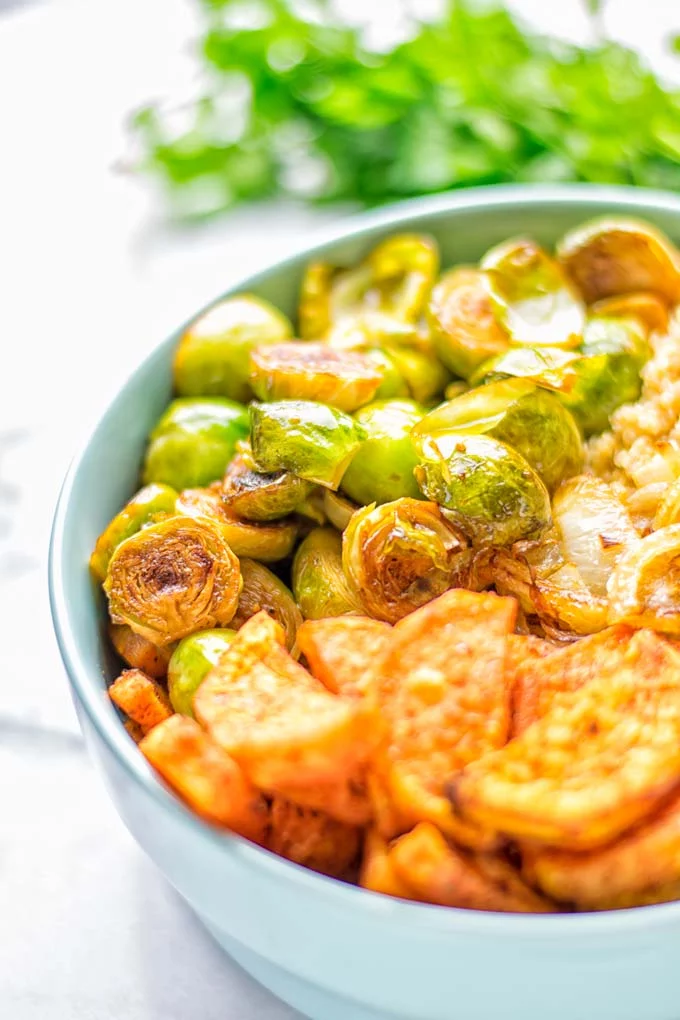 This Cajun Sweet Potato Brussels Sprout Salad is naturally vegan, gluten free and super easy to make. It’s so delicious for lunch, dinner, meal prep, work lunch, holidays and Christmas. Try it now, make this keeper again and again. #vegan #glutenfree #dairyfree #vegetarian #contentednesscooking #mealprep #worklunchideas #dinner #lunch #brusselsproutsalad #cajunsweetpotatoes #holidayfood #christmasrecipes #roastedbrusselssprouts #christmasfood #holidayrecipes 