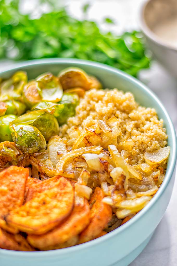 This Cajun Sweet Potato Brussels Sprout Salad is naturally vegan, gluten free and super easy to make. It’s so delicious for lunch, dinner, meal prep, work lunch, holidays and Christmas. Try it now, make this keeper again and again. #vegan #glutenfree #dairyfree #vegetarian #contentednesscooking #mealprep #worklunchideas #dinner #lunch #brusselsproutsalad #cajunsweetpotatoes #holidayfood #christmasrecipes #roastedbrusselssprouts #christmasfood #holidayrecipes 