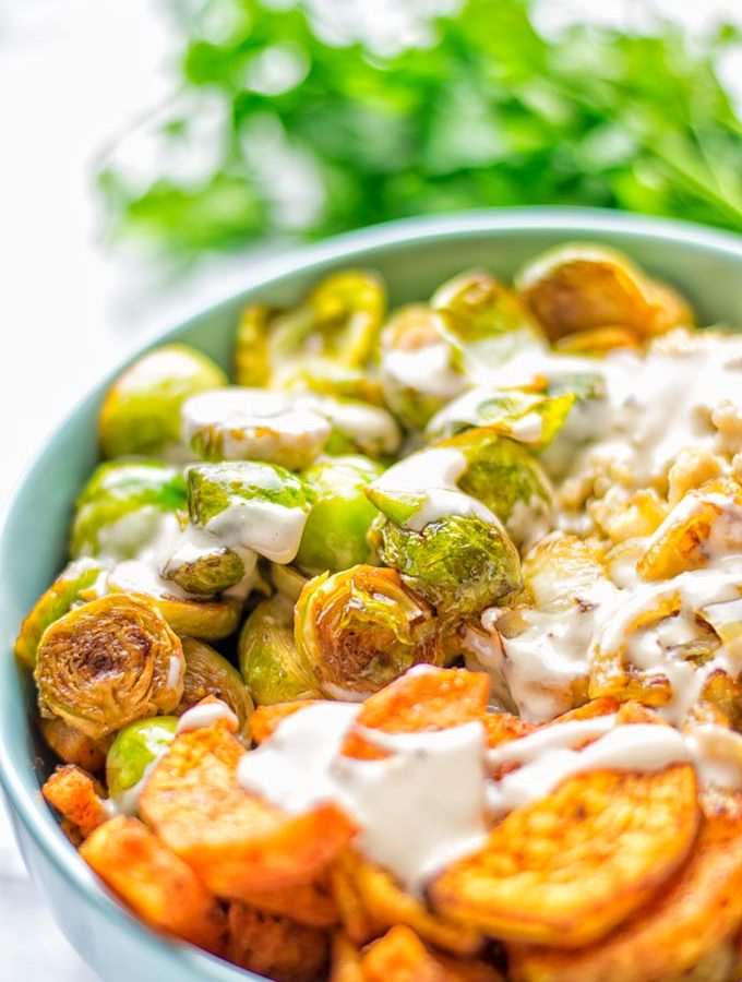 This Cajun Sweet Potato Brussels Sprout Salad is naturally vegan, gluten free and super easy to make. It’s so delicious for lunch, dinner, meal prep, work lunch, holidays and Christmas. Try it now, make this keeper again and again. #vegan #glutenfree #dairyfree #vegetarian #contentednesscooking #mealprep #worklunchideas #dinner #lunch #brusselsproutsalad #cajunsweetpotatoes #holidayfood #christmasrecipes #roastedbrusselssprouts #christmasfood #holidayrecipes
