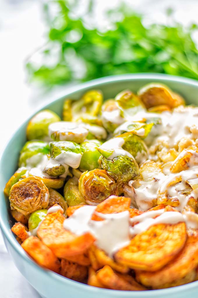 This Cajun Sweet Potato Brussels Sprout Salad is naturally vegan, gluten free and super easy to make. It’s so delicious for lunch, dinner, meal prep, work lunch, holidays and Christmas. Try it now, make this keeper again and again. #vegan #glutenfree #dairyfree #vegetarian #contentednesscooking #mealprep #worklunchideas #dinner #lunch #brusselsproutsalad #cajunsweetpotatoes #holidayfood #christmasrecipes #roastedbrusselssprouts #christmasfood #holidayrecipes 