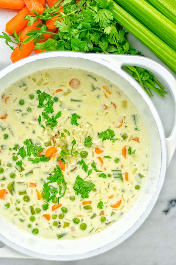 This Cream of Wild Rice Soup is entirely vegan, gluten free and super easy to make in one pot. An amazing soup for dinner, lunch, meal preparation, work lunch and the holidays that the whole family will love. #vegan #dairyfree #glutenfree #vegetarian #onepotmeals #soup #mealprep #worklunchideas #thanksgiving #holidays #contentednesscooking #wildricesoup #wildrice #wildricerecipes #dinner #lunch