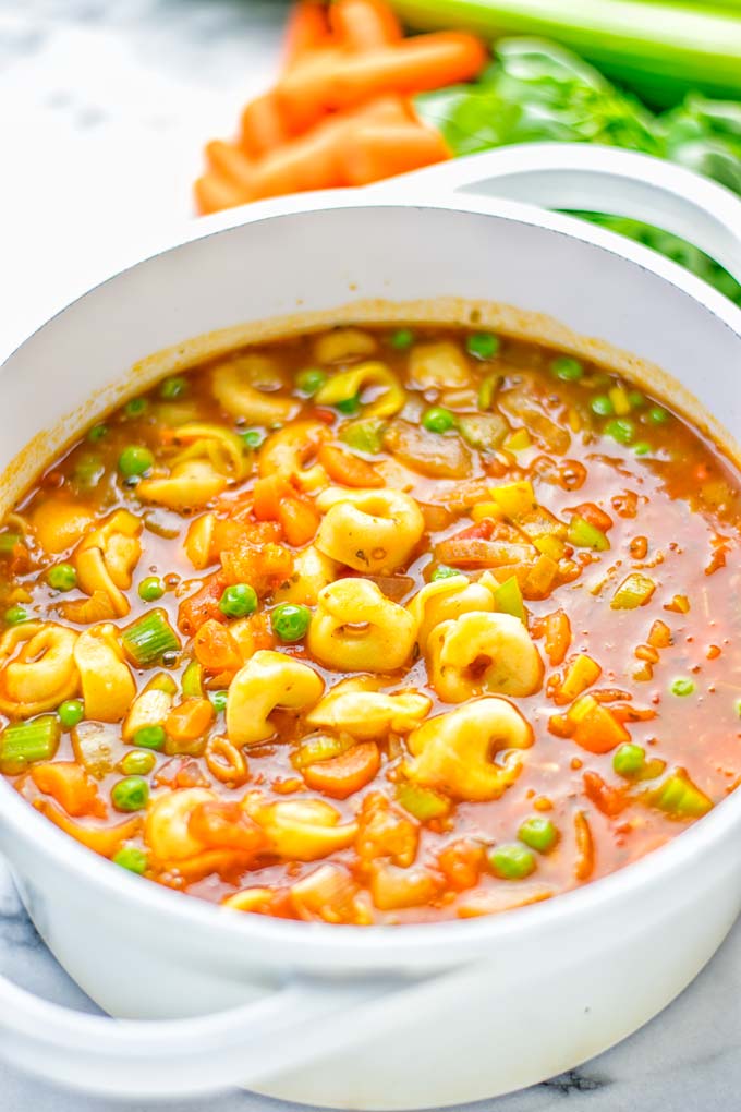 This Minestrone Tortellini Soup is entirely vegan, gluten free and super easy to make in one pot. If you’re looking for a delicious minestrone recipe look no further and try it now for dinner, lunch, meal preparation or an amazing work lunch! #vegan #glutenfree #dairyfree #vegetarian #contentednesscooking #mealprep #onepotmeals #dinner #lunch #worklunchideas #minestrone #tortellinisoup #minestronesoup 