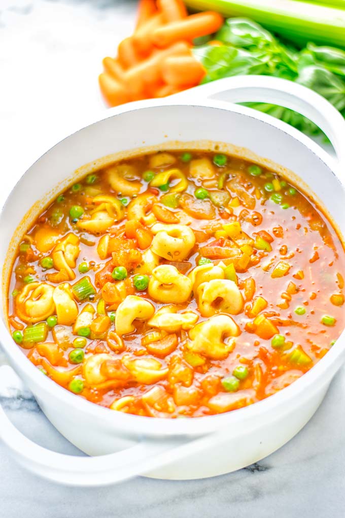 This Minestrone Tortellini Soup is entirely vegan, gluten free and super easy to make in one pot. If you’re looking for a delicious minestrone recipe look no further and try it now for dinner, lunch, meal preparation or an amazing work lunch! #vegan #glutenfree #dairyfree #vegetarian #contentednesscooking #mealprep #onepotmeals #dinner #lunch #worklunchideas #minestrone #tortellinisoup #minestronesoup 