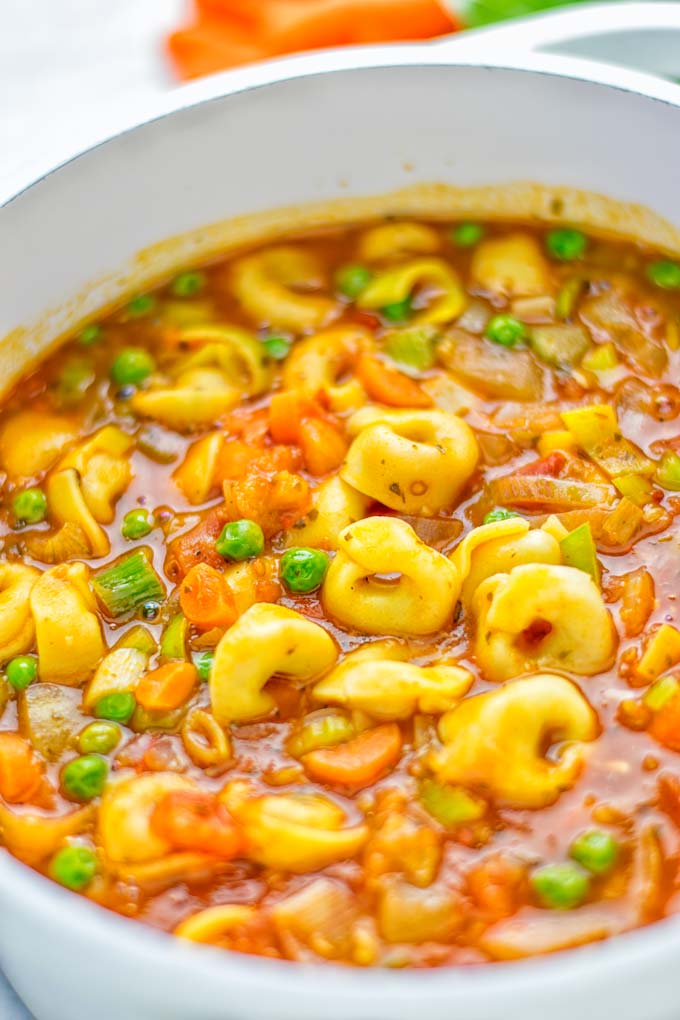 This Minestrone Tortellini Soup is entirely vegan, gluten free and super easy to make in one pot. If you’re looking for a delicious minestrone recipe look no further and try it now for dinner, lunch, meal preparation or an amazing work lunch! #vegan #glutenfree #dairyfree #vegetarian #contentednesscooking #mealprep #onepotmeals #dinner #lunch #worklunchideas #minestrone #tortellinisoup #minestronesoup 