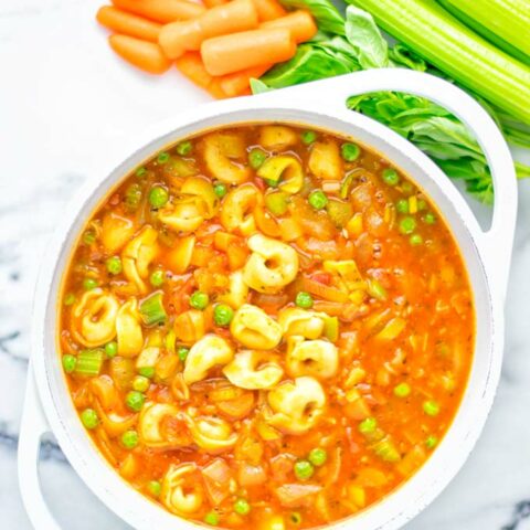 This Minestrone Tortellini Soup is entirely vegan, gluten free and super easy to make in one pot. If you’re looking for a delicious minestrone recipe look no further and try it now for dinner, lunch, meal preparation or an amazing work lunch! #vegan #glutenfree #dairyfree #vegetarian #contentednesscooking #mealprep #onepotmeals #dinner #lunch #worklunchideas #minestrone #tortellinisoup #minestronesoup