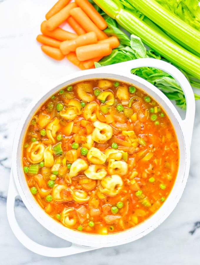 This Minestrone Tortellini Soup is entirely vegan, gluten free and super easy to make in one pot. If you’re looking for a delicious minestrone recipe look no further and try it now for dinner, lunch, meal preparation or an amazing work lunch! #vegan #glutenfree #dairyfree #vegetarian #contentednesscooking #mealprep #onepotmeals #dinner #lunch #worklunchideas #minestrone #tortellinisoup #minestronesoup