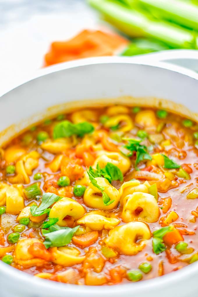 This Minestrone Tortellini Soup is entirely vegan, gluten free and super easy to make in one pot. If you’re looking for a delicious minestrone recipe look no further and try it now for dinner, lunch, meal preparation or an amazing work lunch! #vegan #glutenfree #dairyfree #vegetarian #contentednesscooking #mealprep #onepotmeals #dinner #lunch #worklunchideas #minestrone #tortellinisoup #minestronesoup 