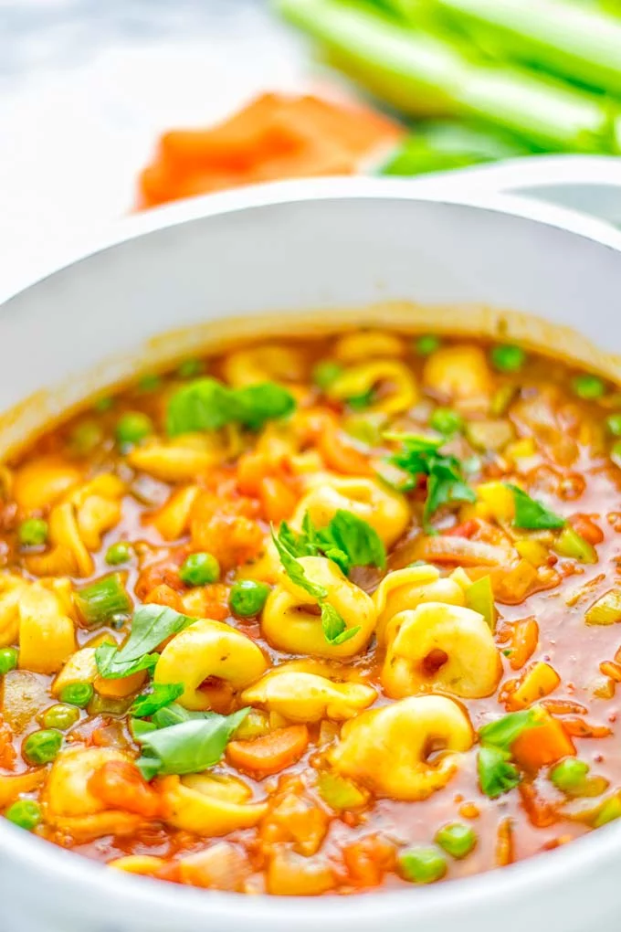 This Minestrone Tortellini Soup is entirely vegan, gluten free and super easy to make in one pot. If you’re looking for a delicious minestrone recipe look no further and try it now for dinner, lunch, meal preparation or an amazing work lunch! #vegan #glutenfree #dairyfree #vegetarian #contentednesscooking #mealprep #onepotmeals #dinner #lunch #worklunchideas #minestrone #tortellinisoup #minestronesoup 