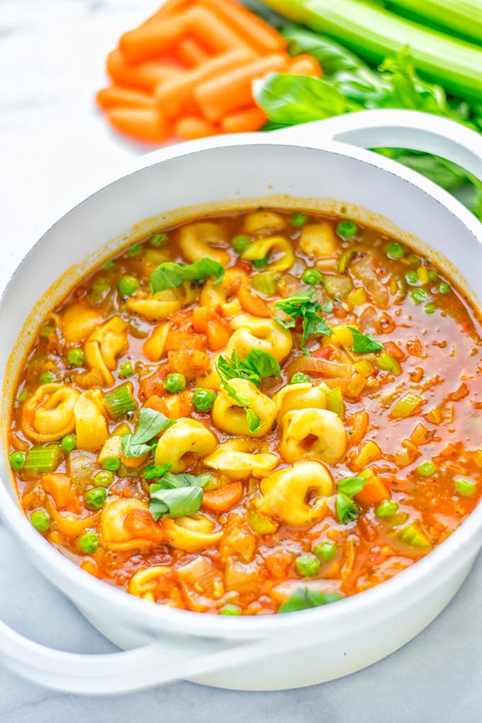 This Minestrone Tortellini Soup is entirely vegan, gluten free and super easy to make in one pot. If you’re looking for a delicious minestrone recipe look no further and try it now for dinner, lunch, meal preparation or an amazing work lunch! #vegan #glutenfree #dairyfree #vegetarian #contentednesscooking #mealprep #onepotmeals #dinner #lunch #worklunchideas #minestrone #tortellinisoup #minestronesoup 