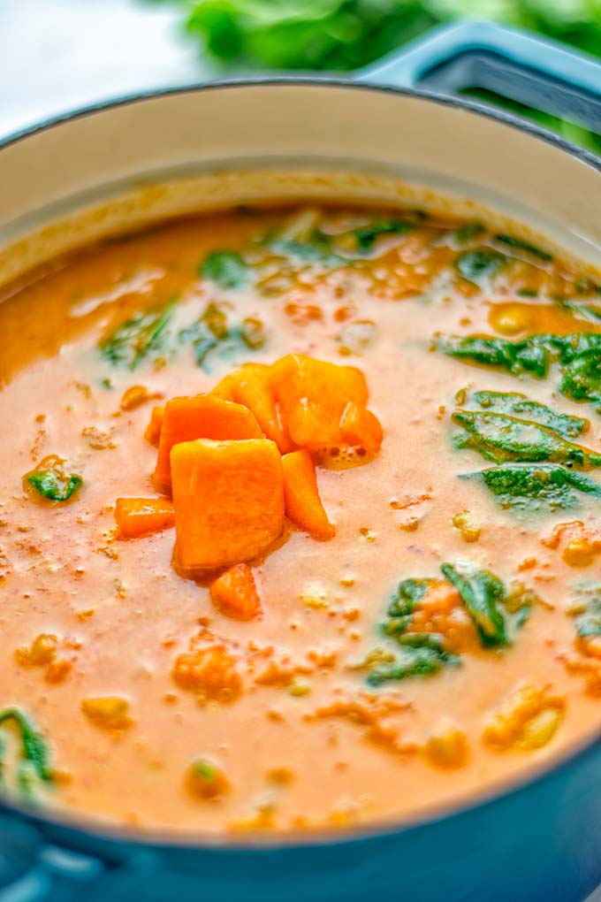 Amazingly satisfying Pumpkin Red Curry. Naturally vegan, gluten free, and so easy to make in one pot. An amazing one pot meal for the holidays, dinner, lunch, meal preparation, and so much more. #vegan #glutenfree #dairyfree #vegetarian #curry #pumpkin #pumpkincurryvegan #dinner #lunch #mealprep #worklunchideas #contentednesscooking #holidays