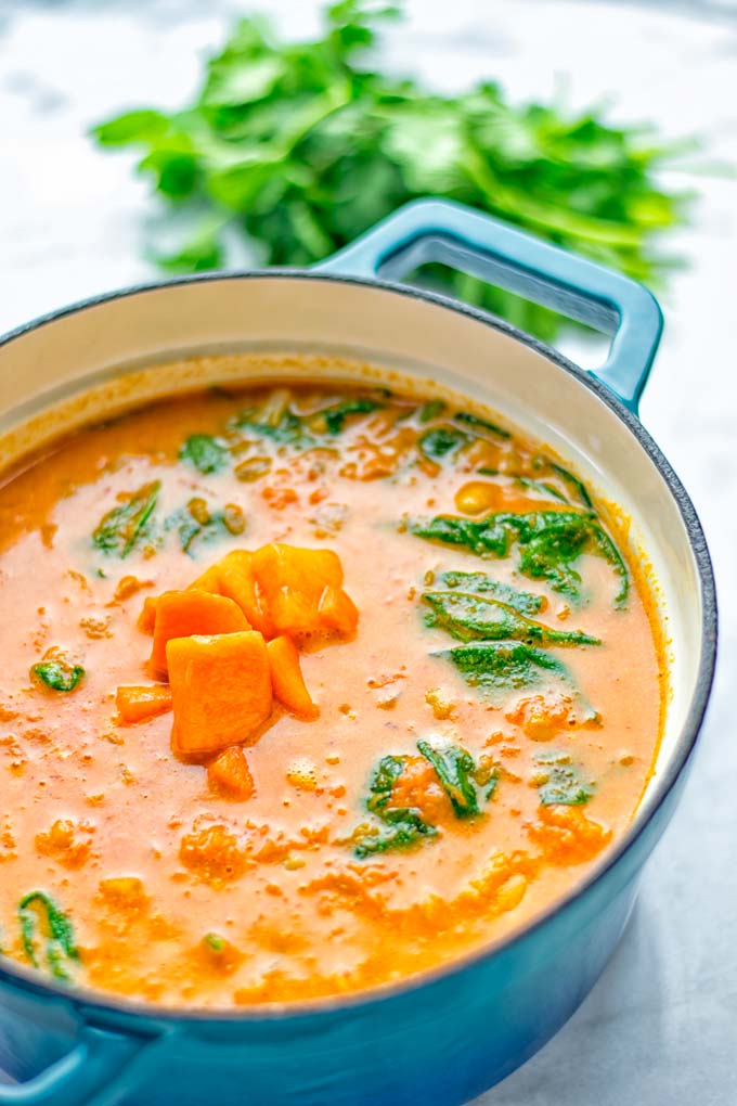 Amazingly satisfying Pumpkin Red Curry. Naturally vegan, gluten free, and so easy to make in one pot. An amazing one pot meal for the holidays, dinner, lunch, meal preparation, and so much more. #vegan #glutenfree #dairyfree #vegetarian #curry #pumpkin #pumpkincurryvegan #dinner #lunch #mealprep #worklunchideas #contentednesscooking #holidays