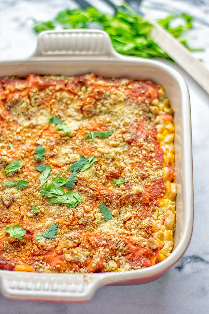 Super easy and insanely delicious White Chili Lasagna. Entirely vegan, gluten free and seriously so addictive. It’s fantastic for dinner, lunch, meal preparation, work lunch that the whole family will love. Also a keeper for the holidays and date night. If you’re looking for an easy lasagna recipe try this, now. #vegan #dairyfree #glutenfree #vegetarian #lasagna #mealprep #worklunchideas #whitechili #whitechilirecipes #holidays #dinner #lunch #datenightrecipesdinner #contentednesscooking