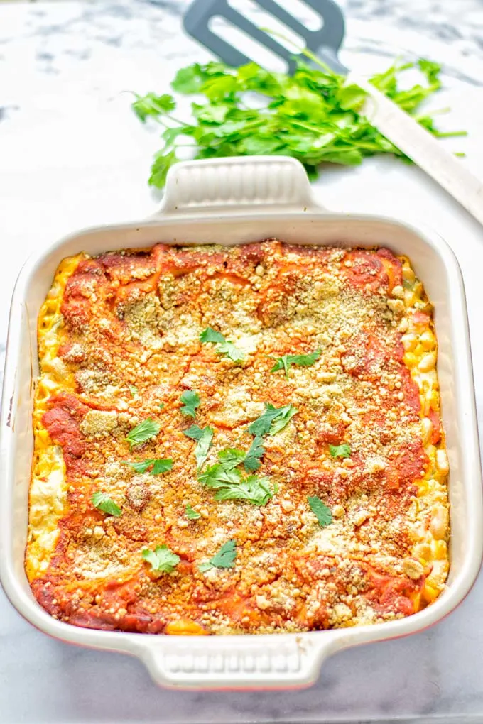 Super easy and insanely delicious White Chili Lasagna. Entirely vegan, gluten free and seriously so addictive. It’s fantastic for dinner, lunch, meal preparation, work lunch that the whole family will love. Also a keeper for the holidays and date night. If you’re looking for an easy lasagna recipe try this, now. #vegan #dairyfree #glutenfree #vegetarian #lasagna #mealprep #worklunchideas #whitechili #whitechilirecipes #holidays #dinner #lunch #datenightrecipesdinner #contentednesscooking