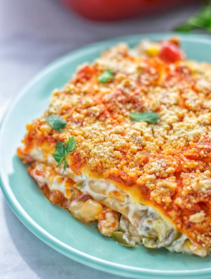 Super easy and insanely delicious White Chili Lasagna. Entirely vegan, gluten free and seriously so addictive. It’s fantastic for dinner, lunch, meal preparation, work lunch that the whole family will love. Also a keeper for the holidays and date night. If you’re looking for an easy lasagna recipe try this, now. #vegan #dairyfree #glutenfree #vegetarian #lasagna #mealprep #worklunchideas #whitechili #whitechilirecipes #holidays #dinner #lunch #datenightrecipesdinner #contentednesscooking