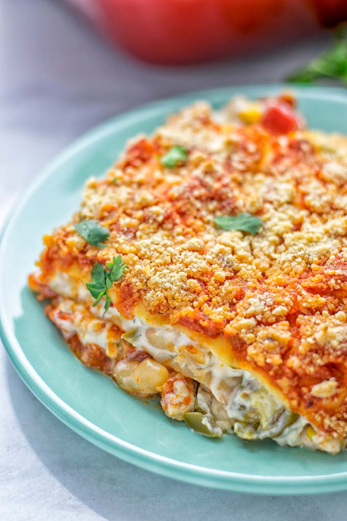 Super easy and insanely delicious White Chili Lasagna. Entirely vegan, gluten free and seriously so addictive. It’s fantastic for dinner, lunch, meal preparation, work lunch that the whole family will love. Also a keeper for the holidays and date night. If you’re looking for an easy lasagna recipe try this, now. #vegan #dairyfree #glutenfree #vegetarian #lasagna #mealprep #worklunchideas #whitechili #whitechilirecipes #holidays #dinner #lunch #datenightrecipesdinner #contentednesscooking