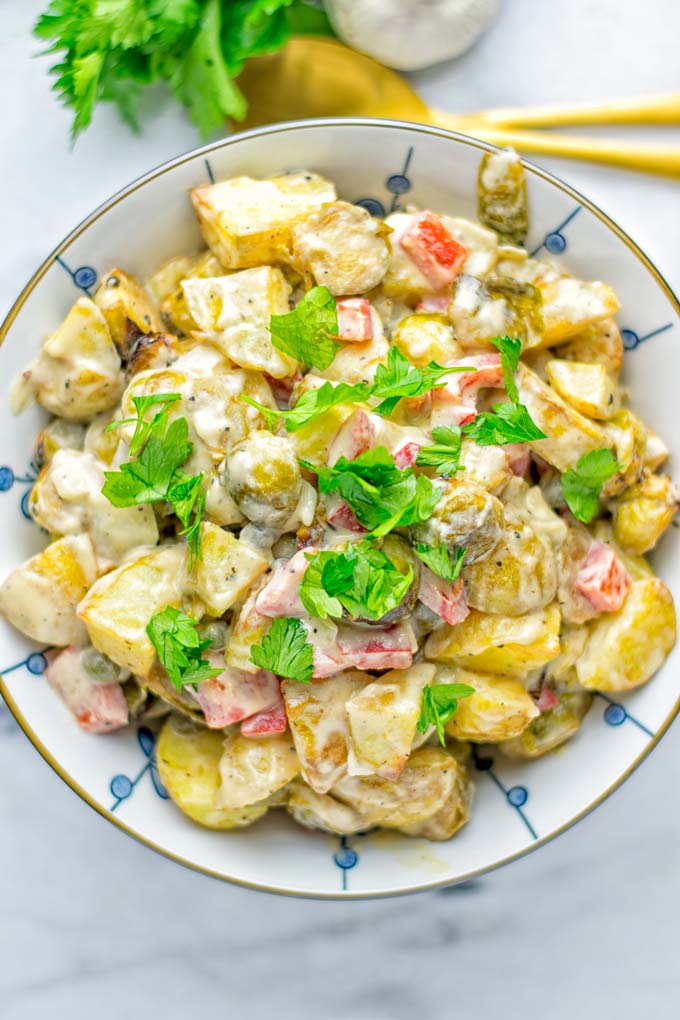 This Balsamic Brussels Sprouts Potato Salad is the ultimate comfort food and entirely vegan, gluten free. It’s super delicious for dinner, lunch, meal prep and for Christmas or the holidays. Try it now and you can be sure the whole family will love it. #vegan #glutenfree #dairyfree #vegetarian #contentednesscooking #dinner #lunch #christmasfood #holidayfood #worklunchideas #mealprep #balsamicbrusselssprouts #potatosalad