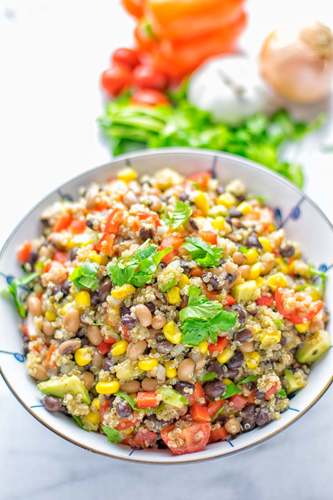 This Cowboy Caviar Quinoa Salad is naturally vegan, gluten free, and so satisfying. It has all the flavors you’ll love and is super easy to make for dinner, lunch, meal prep and so much more. Enjoy and try it now You’ll know how easy it can be. #vegan #glutenfree #dairyfree #vegetarian #cowboycaviar #quinoasalad #dinner #lunch #mealprep #worklunchideas #contentednesscooking #healthymeals #newyearhealthyeating #potluckideas #partyfood