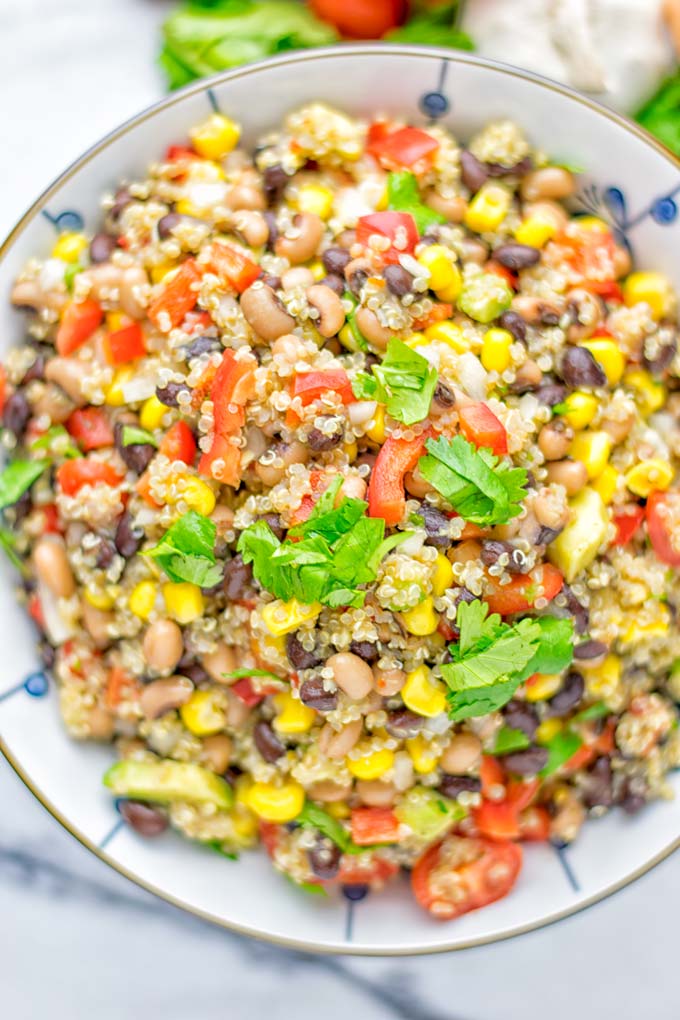 This Cowboy Caviar Quinoa Salad is naturally vegan, gluten free, and so satisfying. It has all the flavors you’ll love and is super easy to make for dinner, lunch, meal prep and so much more. Enjoy and try it now You’ll know how easy it can be. #vegan #glutenfree #dairyfree #vegetarian #cowboycaviar #quinoasalad #dinner #lunch #mealprep #worklunchideas #contentednesscooking #healthymeals #newyearhealthyeating #potluckideas #partyfood