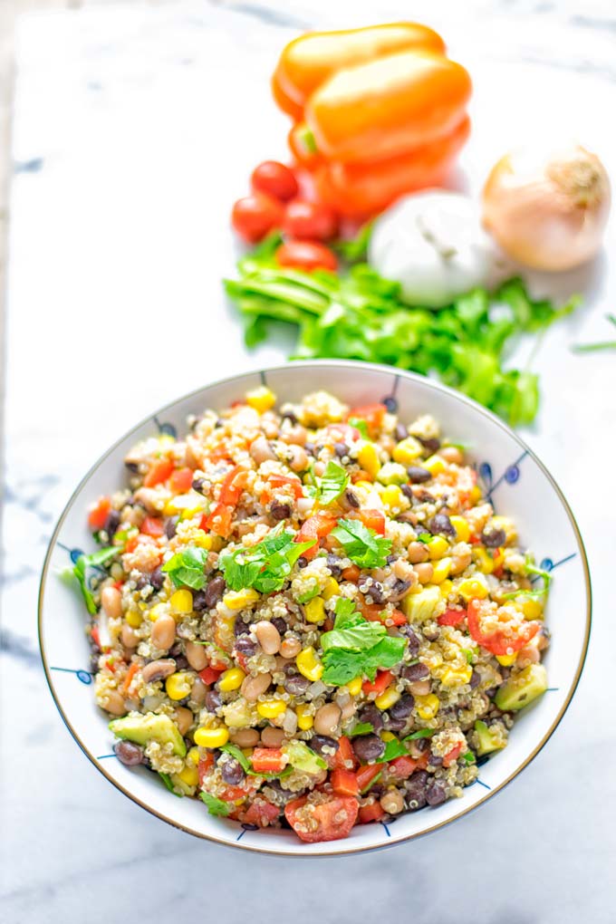 This Cowboy Caviar Quinoa Salad is naturally vegan, gluten free, and so satisfying. It has all the flavors you’ll love and is super easy to make for dinner, lunch, meal prep and so much more. Enjoy and try it now You’ll know how easy it can be. #vegan #glutenfree #dairyfree #vegetarian #cowboycaviar #quinoasalad #dinner #lunch #mealprep #worklunchideas #contentednesscooking #healthymeals #newyearhealthyeating #potluckideas #partyfood