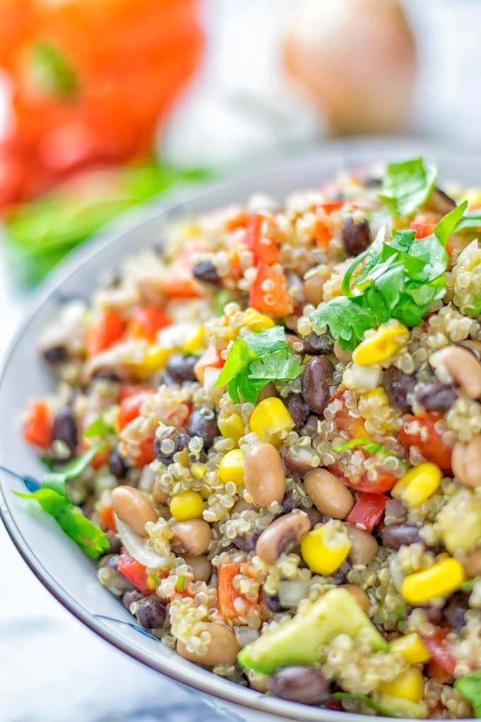 This Cowboy Caviar Quinoa Salad is naturally vegan, gluten free, and so satisfying. It has all the flavors you’ll love and is super easy to make for dinner, lunch, meal prep and so much more. Enjoy and try it now You’ll know how easy it can be. #vegan #glutenfree #dairyfree #vegetarian #cowboycaviar #quinoasalad #dinner #lunch #mealprep #worklunchideas #contentednesscooking #healthymeals #newyearhealthyeating #potluckideas #partyfood