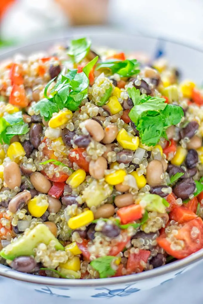 This Cowboy Caviar Quinoa Salad is naturally vegan, gluten free, and so satisfying. It has all the flavors you’ll love and is super easy to make for dinner, lunch, meal prep and so much more. Enjoy and try it now You’ll know how easy it can be. #vegan #glutenfree #dairyfree #vegetarian #cowboycaviar #quinoasalad #dinner #lunch #mealprep #worklunchideas #contentednesscooking #healthymeals #newyearhealthyeating #potluckideas #partyfood