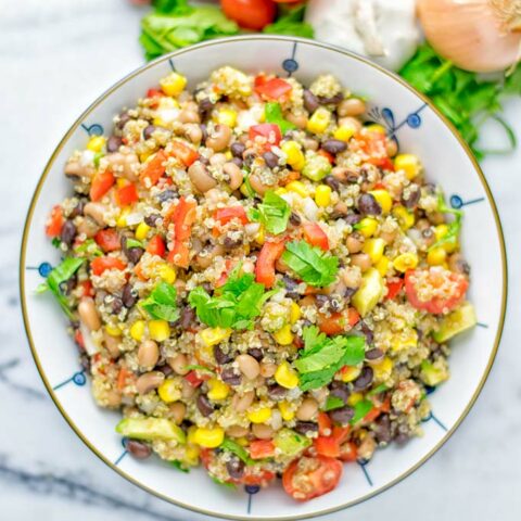 This Cowboy Caviar Quinoa Salad is naturally vegan, gluten free, and so satisfying. It has all the flavors you’ll love and is super easy to make for dinner, lunch, meal prep and so much more. Enjoy and try it now You’ll know how easy it can be. #vegan #glutenfree #dairyfree #vegetarian #cowboycaviar #quinoasalad #dinner #lunch #mealprep #worklunchideas #contentednesscooking #healthymeals #newyearhealthyeating #potluckideas #partyfood