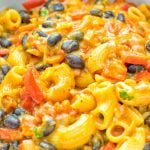 This One Pot Chili Mac & Cheese is super easy to make. It’s insanely creamy, vegan, gluten free and ready in 20 minutes on the table. If you’re looking for easy one pot meals that the whole family will love try it now and learn how easy meal preparation, dinner, lunch, work lunches and more can be. #vegan #glutenfree #vegetarian #dairyfree #onepotmeals #contentednesscooking #lunch #dinner #worklunchideas #mealprep #chilimacandcheese