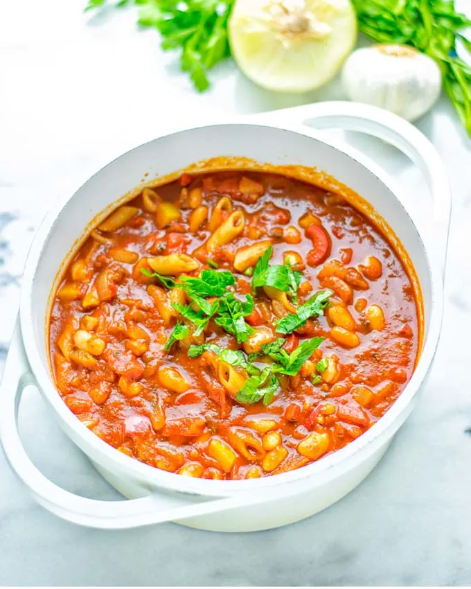 This Pasta Fagioli Soup is super easy to make in one pot and entirely vegan, gluten free. It’s packed with so many delicious flavors and perfect for dinner, lunch, meal prep, work lunch and so much more. Try it and learn how easy it can be to make food for the whole family. #vegan #glutenfree #dairyfree #onepotmeals #vegetarian #contentednesscooking #mealprep #worklunchideas #dinner #lunch #pastafagiolisoup #20minutemeals