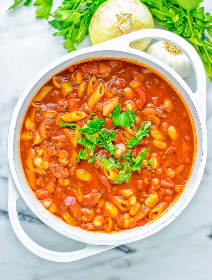 This Pasta Fagioli Soup is super easy to make in one pot and entirely vegan, gluten free. It’s packed with so many delicious flavors and perfect for dinner, lunch, meal prep, work lunch and so much more. Try it and learn how easy it can be to make food for the whole family. #vegan #glutenfree #dairyfree #onepotmeals #vegetarian #contentednesscooking #mealprep #worklunchideas #dinner #lunch #pastafagiolisoup #20minutemeals