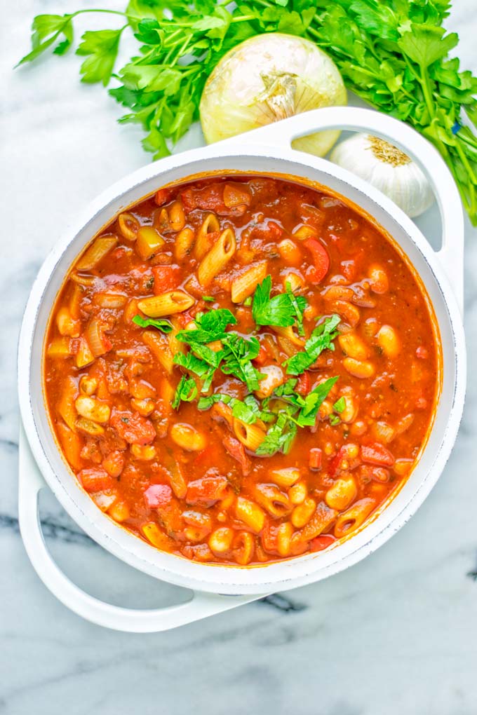 This Pasta Fagioli Soup is super easy to make in one pot and entirely vegan, gluten free. It’s packed with so many delicious flavors and perfect for dinner, lunch, meal prep, work lunch and so much more. Try it and learn how easy it can be to make food for the whole family. #vegan #glutenfree #dairyfree #onepotmeals #vegetarian #contentednesscooking #mealprep #worklunchideas #dinner #lunch #pastafagiolisoup #20minutemeals