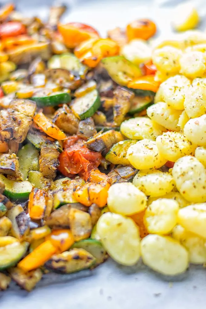 This Sheet Pan Ratatouille Gnocchi are super easy to make and naturally vegan, gluten free. It’s made on a sheet pan which is a breeze for dinner, lunch, meal prep and work lunches. Try it now and the whole family will love it. #vegan #dairyfree #glutenfree #vegetarian #gnocchi #ratatouille #sheetpanmeals #contentednesscooking #dinner #lunch #mealprep #worklunchideas #familyfood #newyearhealtyeating