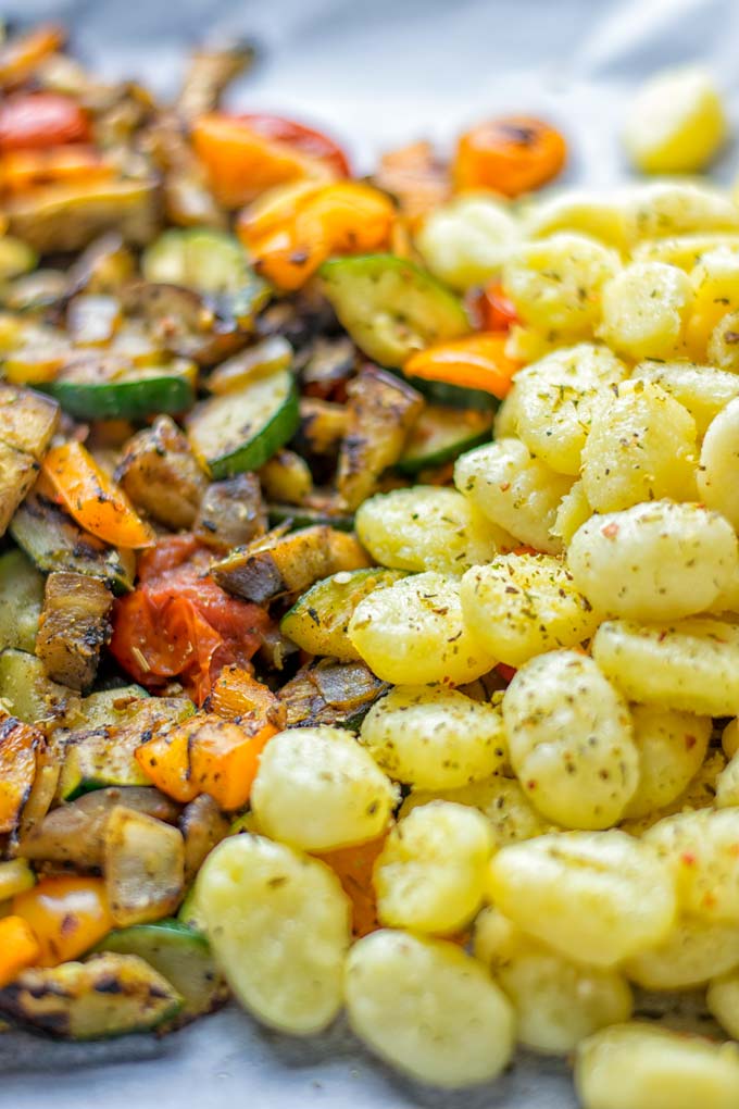 This Sheet Pan Ratatouille Gnocchi are super easy to make and naturally vegan, gluten free. It’s made on a sheet pan which is a breeze for dinner, lunch, meal prep and work lunches. Try it now and the whole family will love it. #vegan #dairyfree #glutenfree #vegetarian #gnocchi #ratatouille #sheetpanmeals #contentednesscooking #dinner #lunch #mealprep #worklunchideas #familyfood #newyearhealtyeating 