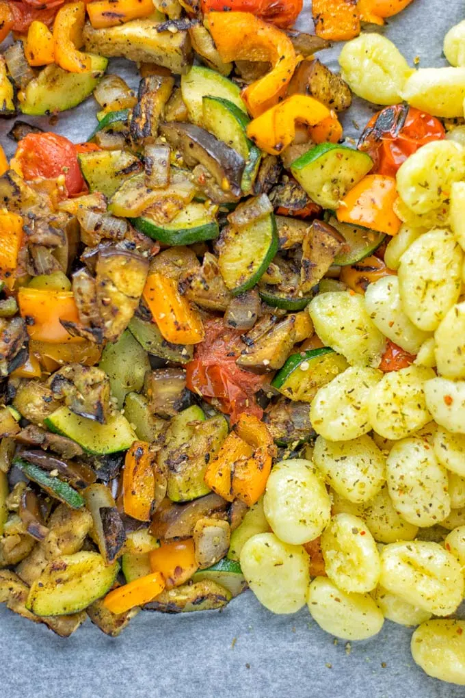 This Sheet Pan Ratatouille Gnocchi are super easy to make and naturally vegan, gluten free. It’s made on a sheet pan which is a breeze for dinner, lunch, meal prep and work lunches. Try it now and the whole family will love it. #vegan #dairyfree #glutenfree #vegetarian #gnocchi #ratatouille #sheetpanmeals #contentednesscooking #dinner #lunch #mealprep #worklunchideas #familyfood #newyearhealtyeating 